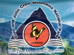 09B Blue and John Crow Mountains National Park and World Heritage Site, The Blue Mountains Experience banner sign at Holywell near Kingston Jamaica